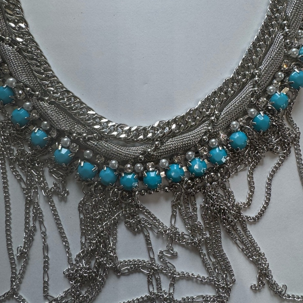 Silver and Blue Statement Necklace and Earrings
0504 - Picture 3 of 3